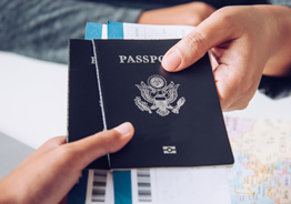 Handing over passport and bording pass